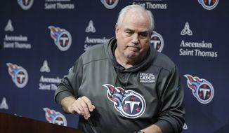Tennessee Titans defensive coordinator Dean Pees leaves the podium after announcing he will be retiring from football Monday, Jan. 20, 2020, in Nashville, Tenn. Pees just finished his second season with the Titans as defensive coordinator, and his 47th year in coaching. (AP Photo/Mark Humphrey)