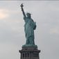 In this Aug. 14, 2019 file photo, The Statue of Liberty is shown in New York. The Department of Homeland Security says New York residents will be cut off from ‘trusted traveler’ programs because of a state law that prevents immigration officials from accessing motor vehicle records. Acting Deputy DHS Secretary Ken Cuccinelli says tens of thousands of New Yorkers will be inconvenienced by the action.  (AP Photo/Kathy Willens)