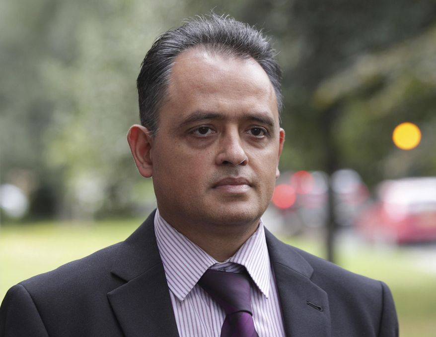 FILE - This Aug. 31, 2017 file photo, shows Manish Shah. The British doctor who sexually assaulted two dozen female patients was sentenced to at least 15 years in prison Friday Feb. 7, 2020. (Yui Mok/PA via AP, file)