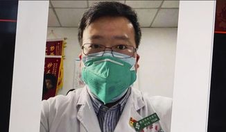 This image from video, shows a selfie of Dr. Li Wenliang. The Chinese doctor who got in trouble with authorities in the communist country for sounding an early warning about the coronavirus outbreak died Friday, Feb. 7, 2020, after coming down with the illness. The Wuhan Central Hospital said on its social media account that Dr. Li, a 34-year-old ophthalmologist, was “unfortunately infected during the fight against the pneumonia epidemic of the new coronavirus infection.” (AP Photo)