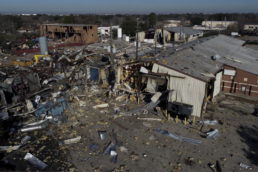 FILE - This Jan. 24, 2020, file aerial photo shows the scene of an explosion that rocked northwest Houston. Attorneys for the family of a 47-year-old man struck by debris from his home when a warehouse in Houston exploded last month say he has died, bringing the number of those killed from the blast to three. Attorneys for the family of Gilberto Mendoza Cruz said he died Wednesday Feb. 5, 2020. The attorneys said Cruz lived within the blast radius of the massive explosion on Jan. 24 at Watson Grinding and Manufacturing Company. Two warehouse workers were killed in the explosion that also injured more than a dozen people and damaged hundreds of nearby structures. (Godofredo A. Vásquez/Houston Chronicle via AP)