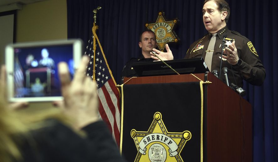 FILE - In this Feb. 1, 2018, file photo, Oakland County Sheriff Mike Bouchard speaks during a news conference in Pontiac, Mich. A man driving what appeared to be a police car didn't fool a suspicious sheriff in suburban Detroit. Bouchard said he was driving away from a meeting Thursday, Feb. 7, 2020, when he spotted a vehicle with police-style bumpers, an array of lights on the back and a decal that read "emergency response." Bouchard activated his emergency lights and stopped the vehicle. He said there was a fake radar on the dashboard and a police-style computer. He also discovered a loaded gun and a large knife. (Max Ortiz/Detroit News via AP File)