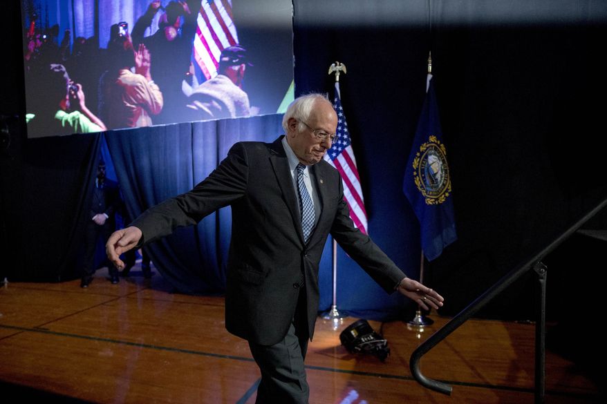 Democratic presidential candidate Sen. Bernie Sanders, I-Vt., arrives to speak at "Our Rights, Our Courts" forum New Hampshire Technical Institute's Concord Community College, Saturday, Feb. 8, 2020, in Concord, N.H. (AP Photo/Andrew Harnik)