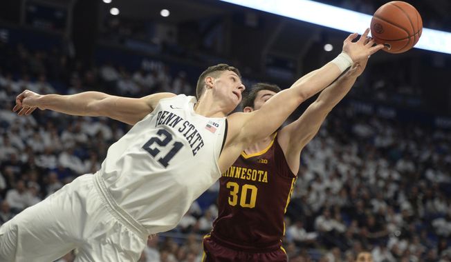 Penn State's John Harrar (21) and Minnesota's Alihan Demir (30) lunge for a rebound during the first half of an NCAA college basketball game, Saturday, Feb. 8, 2020, in State College, Pa. (AP Photo/Gary M. Baranec)