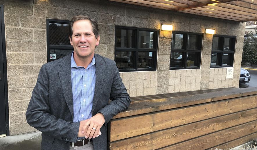 In this Jan. 27, 2020, photo, Knute Buehler, a Republican candidate for a seat in the U.S. House of Representatives, poses for a photo during an interview with The Associated Press in Bend, Ore. In 2018, the Republican party&#x27;s candidate for governor of Oregon painted himself as a centrist, criticized President Donald Trump&#x27;s environmental stance and said he didn&#x27;t want to be linked to divisive national figures. Buehler lost to incumbent Gov. Kate Brown. Now, Buehler is running for a seat in Congress in a district covering a conservative swath of Oregon, and has taken Trump into a tight embrace. (AP Photo/Andrew Selsky)