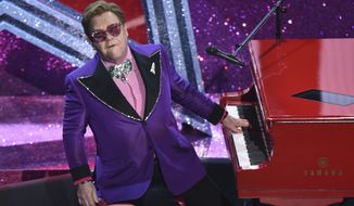 Elton John performs &quot;(I&#39;m Gonna) Love Me Again&quot; nominated for the award for best original song from &quot;Rocketman&quot; at the Oscars on Sunday, Feb. 9, 2020, at the Dolby Theatre in Los Angeles. (AP Photo/Chris Pizzello)