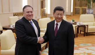 &quot;Indeed, under [Chinese Communist Party General Secretary] Xi Jinping, the country is moving exactly in the opposite direction — more repression, more unfair competition, more predatory economic practices; indeed, a more aggressive military posture as well,&quot; Secretary of State Mike Pompeo said. (Associated Press photograph)