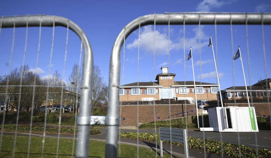 A view of Kents Hill Park Training and Conference Centre, ahead of the repatriation to the UK of the latest Coronavirus evacuees who are due to land at RAF Brize Norton on Sunday, in Milton Keynes, England, Saturday, Feb. 8, 2020. A viral outbreak that began in China has infected more than 34,800 people worldwide. (Joe Giddens/PA via AP)
