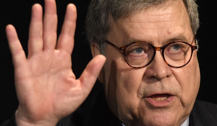 Attorney General William Barr waves after speaking at the National Sheriffs' Association Winter Legislative and Technology Conference in Washington, Monday, Feb. 10, 2020. (AP Photo/Susan Walsh)