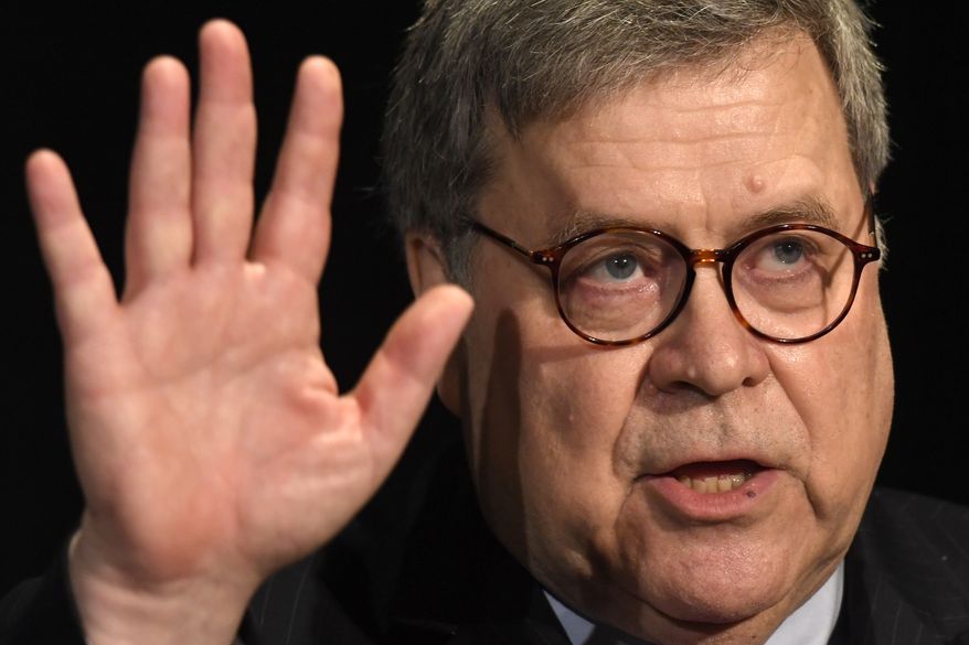 Attorney General William Barr waves after speaking at the National Sheriffs&#39; Association Winter Legislative and Technology Conference in Washington, Monday, Feb. 10, 2020. (AP Photo/Susan Walsh)