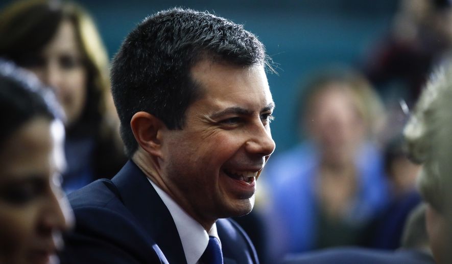 Democratic presidential candidate former South Bend, Ind., Mayor Pete Buttigieg meets with attendees during a campaign event, Monday, Feb. 10, 2020, in Milford, N.H. (AP Photo/Matt Rourke)