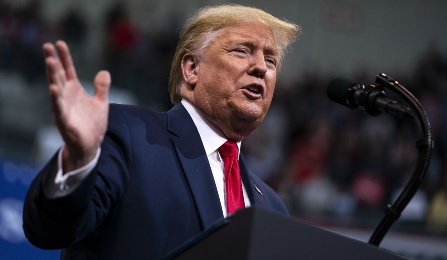 President Donald Trump speaks during a campaign rally Monday, Feb. 10, 2020, in Manchester, N.H. (AP Photo/Evan Vucci)