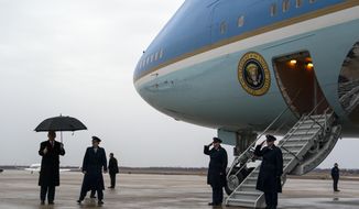 President Donald Trump boards Air Force One to travel to a campaign rally in Manchester, N.H., Monday, Feb. 10, 2020, at Andrews Air Force Base, Md. (AP Photo/Evan Vucci)