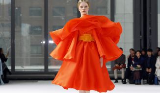The Carolina Herrera collection is modeled during Fashion Week in New York, Monday, Feb. 10, 2020. (AP Photo/Richard Drew)