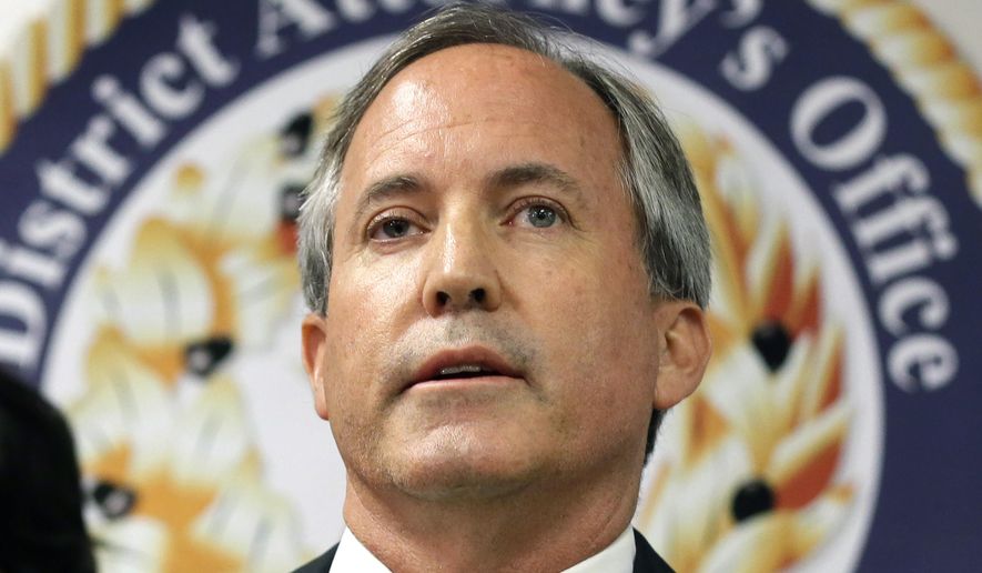 In this June 22, 2017, file photo, Texas Attorney General Ken Paxton speaks at a news conference in Dallas. Paxton on Monday, Feb. 10, 2020, asked the U.S. Supreme Court to overturn a California law that forbids California state employees using taxpayer-funded business trips to expos or conferences in Texas. California adopted the sanctions in response to a 2017 Texas law allowing foster care and adoption agencies to deny services based on religious beliefs. (AP Photo/Tony Gutierrez, File)