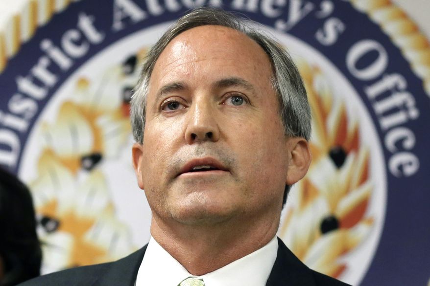 In this June 22, 2017, file photo, Texas Attorney General Ken Paxton speaks at a news conference in Dallas. Paxton on Monday, Feb. 10, 2020, asked the U.S. Supreme Court to overturn a California law that forbids California state employees using taxpayer-funded business trips to expos or conferences in Texas. California adopted the sanctions in response to a 2017 Texas law allowing foster care and adoption agencies to deny services based on religious beliefs. (AP Photo/Tony Gutierrez, File)