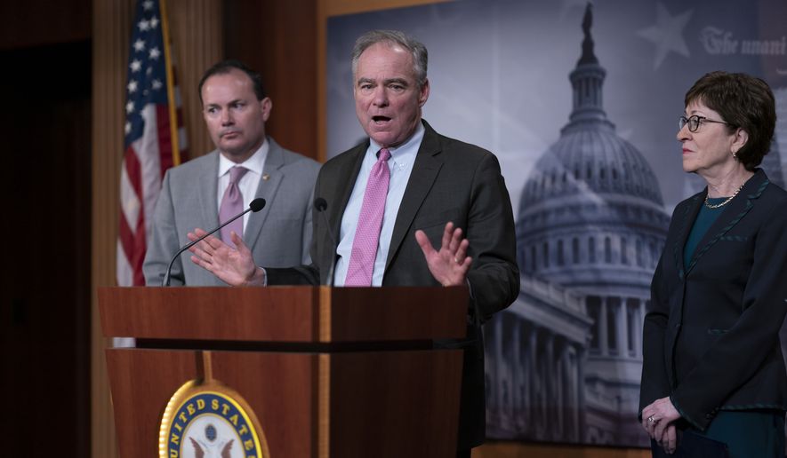 Sen. Tim Kaine, D-Va., center, flanked by Sen. Mike Lee, R-Utah, and Sen. Susan Collins, R-Maine, speaks to reporters just after the Senate advanced a bipartisan resolution asserting that President Donald Trump must seek approval from Congress before engaging in further military action against Iran, at the Capitol in Washington, Wednesday, Feb. 12, 2020. (AP Photo/J. Scott Applewhite)