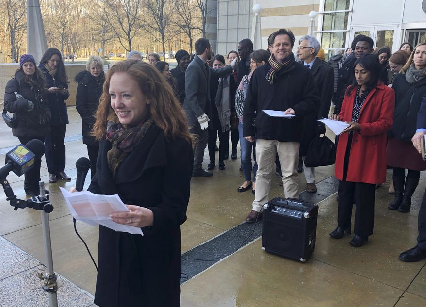 FILE - In this Jan. 8, 2020, file photo, Linda Evarts, an attorney for the International Refugee Assistant Project, speaks to the media outside the federal courthouse in Greenbelt, Md. The federal government is appealing a judge’s decision to block the Trump administration from enforcing an executive order allowing state and local governments to turn away refugees from resettling in their jurisdictions. A notice of appeal filed Tuesday, Feb. 11, by the Justice Department says it is asking the 4th U.S. Circuit Court of Appeals to review the Jan. 15 ruling by U.S. District Judge Peter Messitte in Maryland.(AP Photo/Michael Kunzelman, File)