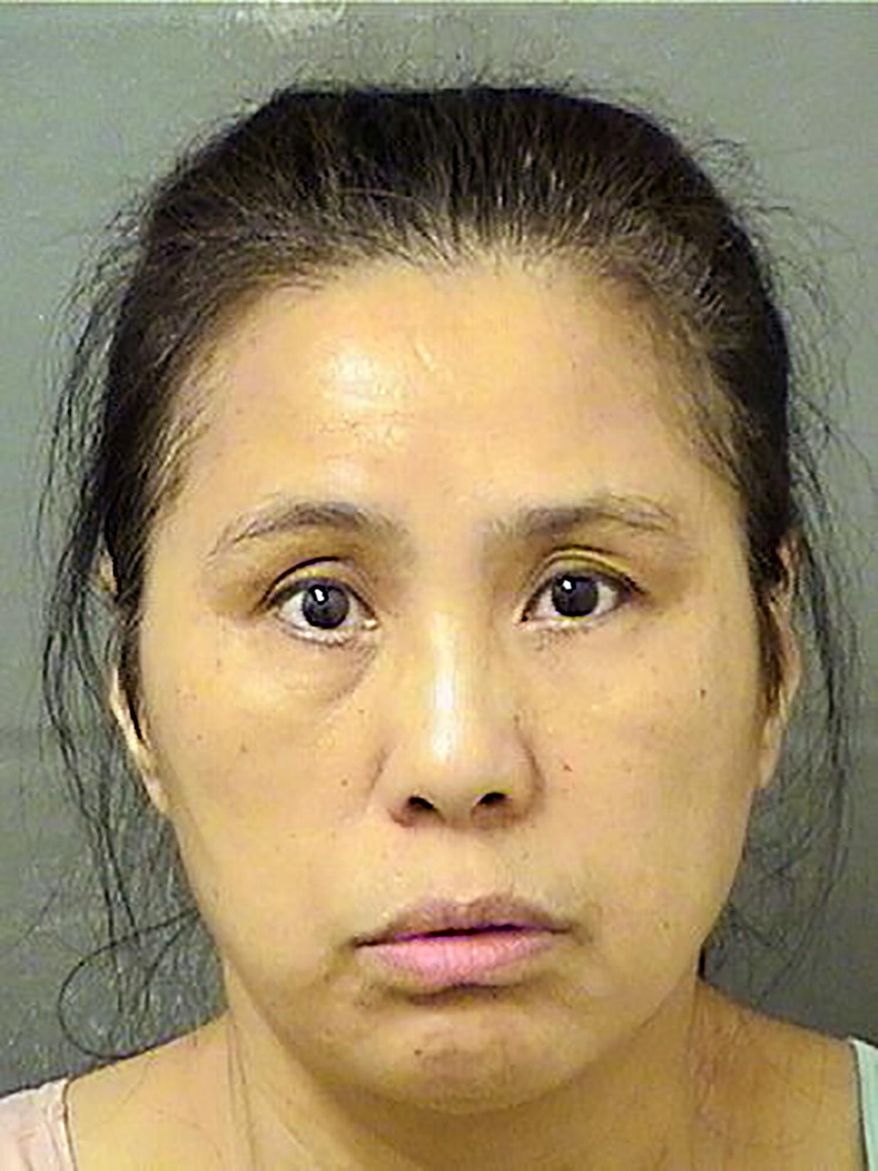This Wednesday, Dec. 18, 2019, file booking photo provided by the Palm Beach County Sheriff's Office, in Fla., shows Jing Lu. (Palm Beach County Sheriff's Office via AP, File)