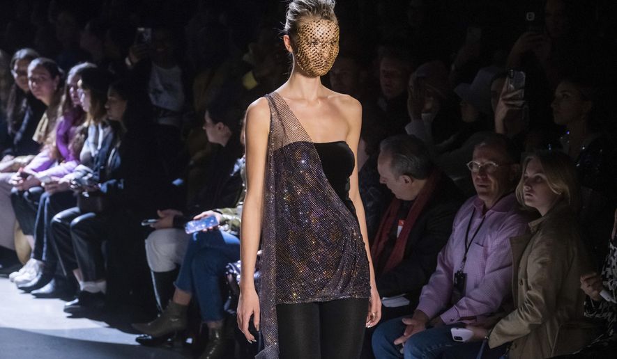 The Christian Cowan collection is modeled at Spring Studios during NYFW Fall/Winter 2020 on Tuesday, Feb. 11, 2020, in New York. (Photo by Charles Sykes/Invision/AP)