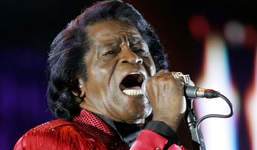 FILE - In this July 6, 2005 file photo,  James Brown performs on stage during the Live 8 concert at Murrayfield Stadium in Edinburgh, Scotland. A prosecutor in Atlanta will decide whether to open a formal investigation after meeting with a woman who says she has evidence the legendary singer's death was caused by another person, his spokesman said. Brown, known as the Godfather of Soul, was 73 when he died of heart failure on Christmas day in 2006 in Atlanta, less than two days after being hospitalized for treatment of pneumonia.   (AP Photo/Matt Dunham, File)
