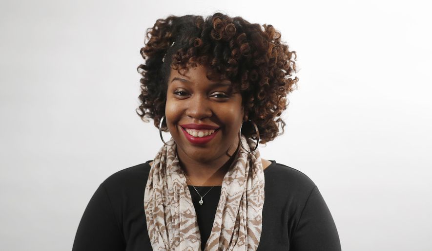 In this Tuesday, Feb. 11, 2020, photo, Katrease Stafford poses for a photo in Detroit. Stafford and Aaron Morrison will join the AP’s Race and Ethnicity team and write about how race intersects with newsworthy topics such as politics, criminal justice, federal policies, the environment, religion, entertainment and sports. (AP Photo/Carlos Osorio)