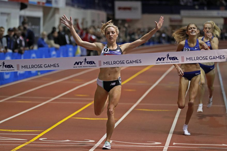 Elle Purrier reacts after winning the NYRR Wanamaker Mile at the Millrose Games track and field meet Saturday, Feb. 8, 2020, in New York. (AP Photo/Adam Hunger)