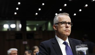 In this May 11, 2017, photo, then-acting FBI Director Andrew McCabe listens during a Senate Intelligence Committee hearing on Capitol Hill in Washington. (AP Photo/Jacquelyn Martin)  **FILE**