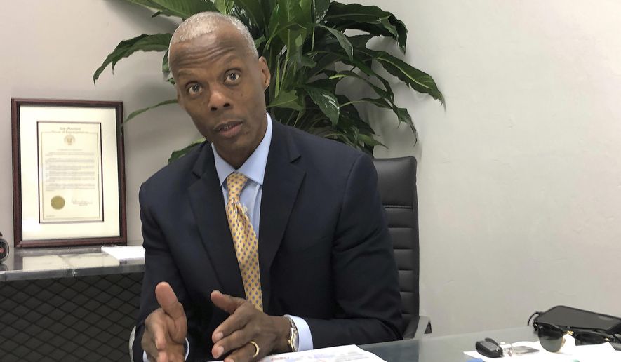 In this Thursday, Feb. 13, 2020, photo, Black News Channel Chairman J.C. Watts discusses the launch of the nations only 24-hour news network during an interview in Tallahassee, Fla. The launch followed years of planning for former U.S. Rep. Watts, who likened it too giving birth to a child. It is also made possible by the backing of billionaire businessman and Jacksonville Jaguars owner Shad Khan. (AP Photo/Brendan Farrington)