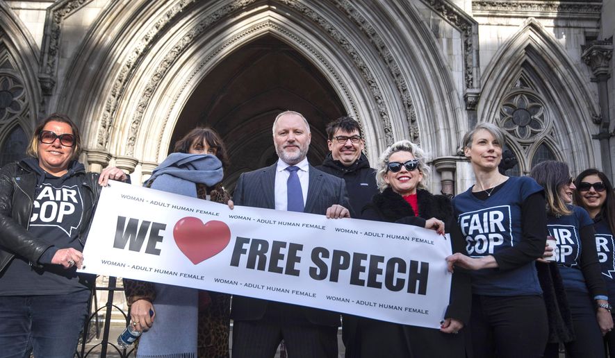 Former police officer Harry Miller arrives outside the High Court, London, Friday, Feb. 14, 2020. A British court ruled Friday that police infringed a man’s right to free expression when they showed up at his workplace to quiz him about his Twitter posts about transgender people. Humberside Police in northeast England investigated Harry Miller in January 2019 after receiving a complaint about allegedly “transphobic” tweets, including a limerick mocking the idea that transgender women are biologically women. (Victoria Jones/PA via AP)