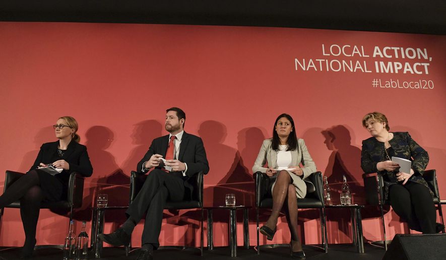 Candidates for leadership of Britain's Labour Party, with from right, Emily Thornberry, Lisa Nandy, Jim McMahon who is attending in place for candidate Kier Starmer, and Rebecca Long-Bailey, on stage during the Labour leadership hustings in Nottingham, England, Saturday Feb. 8, 2020. (Jacob King/PA via AP)