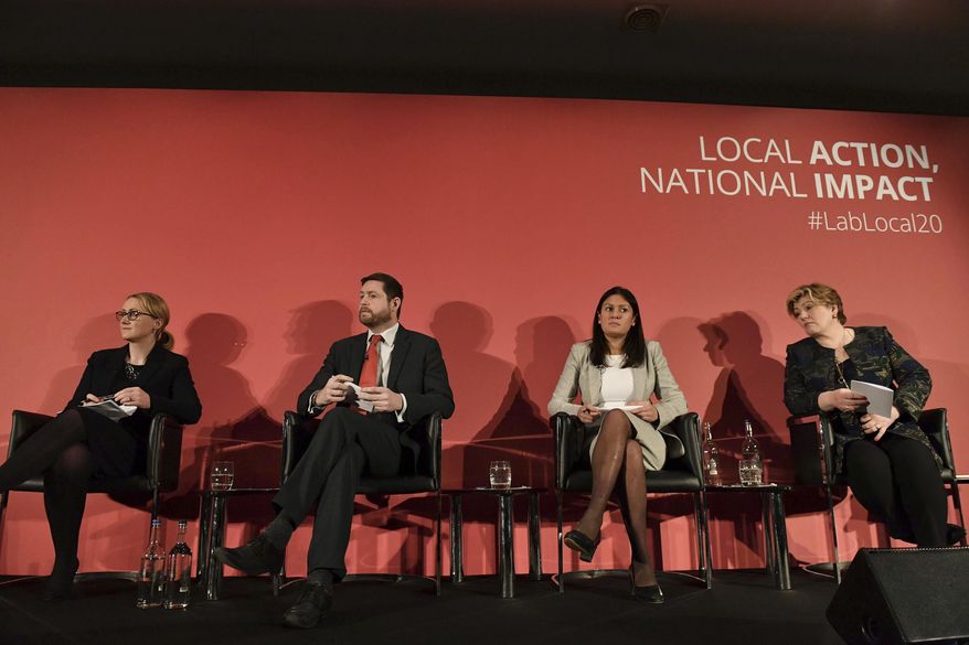 Candidates for leadership of Britain's Labour Party, with from right, Emily Thornberry, Lisa Nandy, Jim McMahon who is attending in place for candidate Kier Starmer, and Rebecca Long-Bailey, on stage during the Labour leadership hustings in Nottingham, England, Saturday Feb. 8, 2020. (Jacob King/PA via AP)