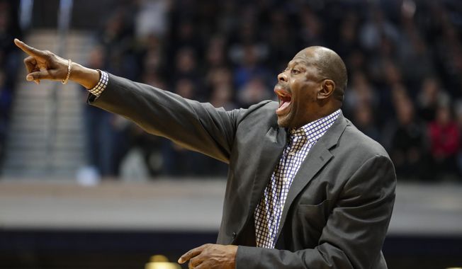 Georgetown head coach Patrick Ewing directs his team against Butler in the second half of an NCAA college basketball game in Indianapolis, Saturday, Feb. 15, 2020. Georgetown defeated Butler 73-66. (AP Photo/Michael Conroy) **FILE**