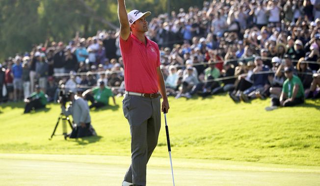 Adam Scott, of Australia, reacts after finishing the Genesis Invitational golf tournament at Riviera Country Club, Sunday, Feb. 16, 2020, in the Pacific Palisades area of Los Angeles. Scott won the tourney.(AP Photo/Ryan Kang)