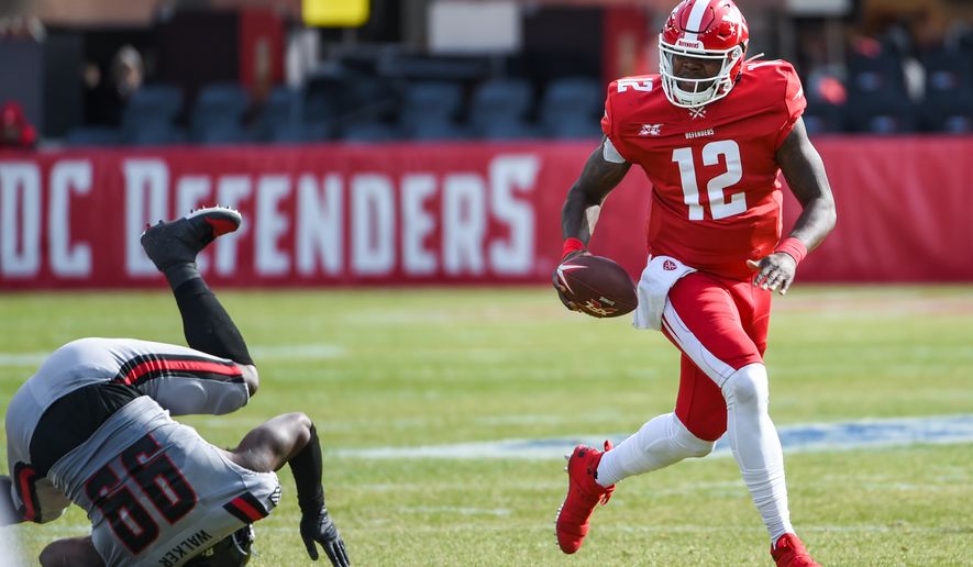 In the XFL&#39;s second weekend of action, DC Defenders quarterback Cardale Jones scrambles away from pressure at Audi Field. Jones led the now-2-0 Defenders to a 27-0 rout of the New York Guardians. (All-Pro Reels photo/Brian Murphy) ** FILE **