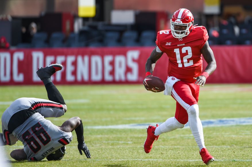In the XFL&#39;s second weekend of action, DC Defenders quarterback Cardale Jones scrambles away from pressure at Audi Field. Jones led the now-2-0 Defenders to a 27-0 rout of the New York Guardians. (All-Pro Reels photo/Brian Murphy) ** FILE **