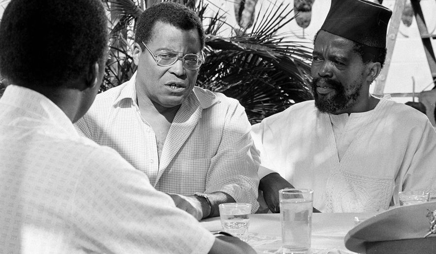 James Earl Jones plays Alex Haley in a scene fro the television mini-series "Roots: The Next Generations," Feb. 1, 1979. Here, Haley is in the African village of Juffure, listening to the storyteller - and finding his roots. (AP Photo)