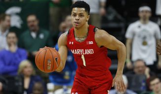 Maryland guard Anthony Cowan Jr. plays against Michigan State in the first half of an NCAA college basketball game in East Lansing, Mich., Saturday, Feb. 15, 2020. (AP Photo/Paul Sancya) ** FILE **