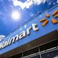This June 25, 2019, file photo shows the entrance to a Walmart in Pittsburgh. Walmart is reporting  disappointing fourth-quarter profits and sales. The nation&#39;s largest retailer says that sales at its U.S. stores heading into the holiday season were weaker than expected. It also said that social unrest in Chile hurt its business. (AP Photo/Gene J. Puskar, File)