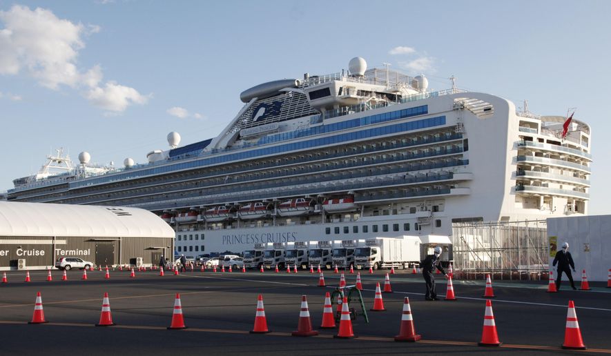 The quarantined cruise ship Diamond Princess is anchored at the Yokohama Port in Yokohama, near Tokyo, Tuesday, Feb. 18, 2020. The cruise ship will begin letting passengers off the boat on Wednesday after it’s been in quarantined for 14 days. (AP Photo/Koji Sasahara)