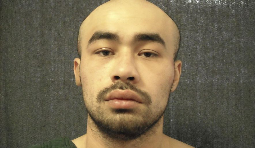 This undated photo provided by Collin County, Texas, Judicial Records Department shows Brandon McCall, who pleaded not guilty on Monday, Feb. 17, 2020, during the first day of his capital murder trial for the 2018 killings of a Dallas-area police officer and another man. (Collin County Judicial Records Department via AP)