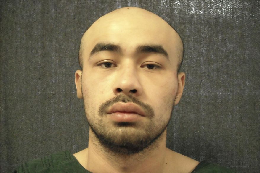 This undated photo provided by Collin County, Texas, Judicial Records Department shows Brandon McCall, who pleaded not guilty on Monday, Feb. 17, 2020, during the first day of his capital murder trial for the 2018 killings of a Dallas-area police officer and another man. (Collin County Judicial Records Department via AP)