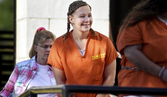 In this June 26, 2018, photo, Reality Winner walks into the Federal Courthouse in Augusta, Ga. (Michael Holahan/The Augusta Chronicle via AP) **FILE**
