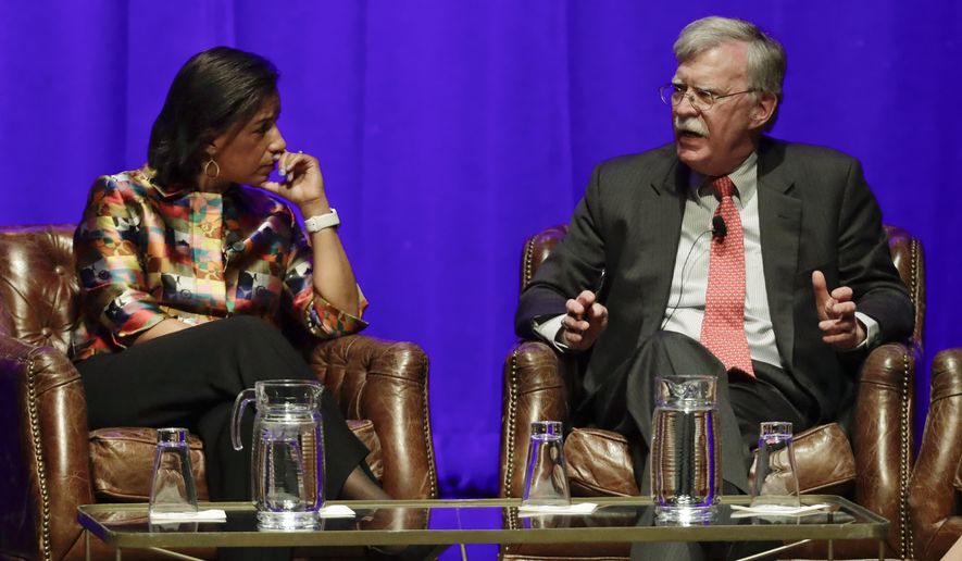 Former national security advisers Susan Rice, left, and John Bolton take part in a discussion on global leadership at Vanderbilt University, Wednesday, Feb. 19, 2020, in Nashville, Tenn. (AP Photo/Mark Humphrey)