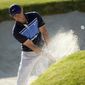 Rory McIlroy, of Northern Ireland, hits out of a bunker onto the 17th green during the final round of the Genesis Invitational golf tournament at Riviera Country Club, Sunday, Feb. 16, 2020, in the Pacific Palisades area of Los Angeles. (AP Photo/Ryan Kang)