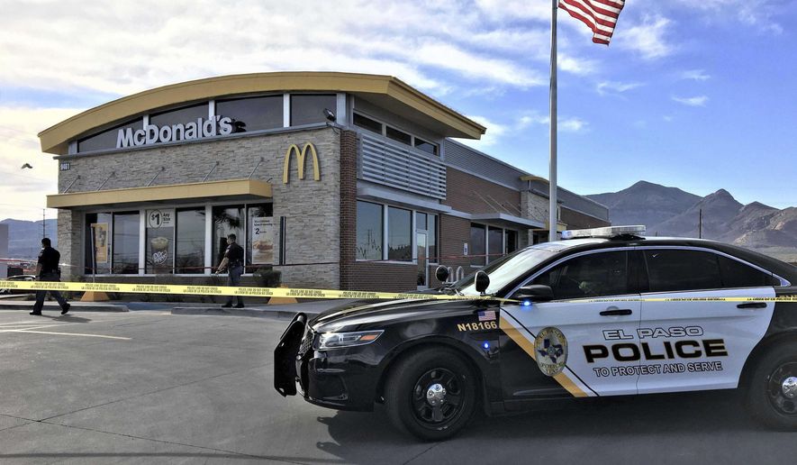 Crime scene tape blocks a McDonald's restaurant after a stabbing report in El Paso, Texas, Tuesday, February 18, 2020. A 25-year-old man was arrested Tuesday afternoon after authorities said he randomly stabbed a child while she was in the play area at the restaurant. The girl was in stable condition at a hospital after undergoing surgery, and the suspect has been arrested, police said. (Daniel Borunda/The El Paso Times via AP)