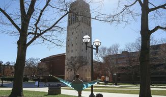 FILE - This April 7, 2017 file photo, shows Burton Tower on the University of Michigan campus in Ann Arbor, Mich. Several former patients have alleged that Robert E. Anderson, a late University of Michigan physician, sexually abused them during exams going back decades, prompting the Ann Arbor school to ask others with information to come forward, officials said Wednesday, Feb. 19, 2020. (Hunter Dyke/Ann Arbor News via AP, File)