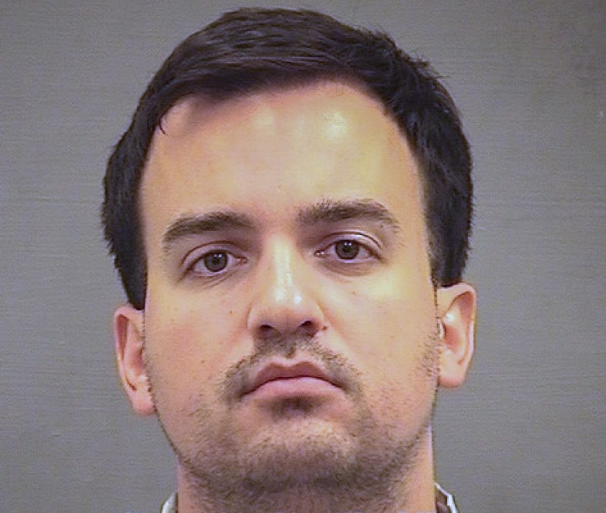This image provided by the Alexandria Sheriff's Office shows Henry Kyle Frese. Frese, a Defense Intelligence Agency official was arrested Wednesday, Oct. 9, 2019, and charged with leaking classified intelligence information to two journalists, including a reporter he was dating, the Justice Department said. Frese was arrested by the FBI when he arrived at work at a DIA facility in Virginia. (Alexandria Sheriff's Office via AP)