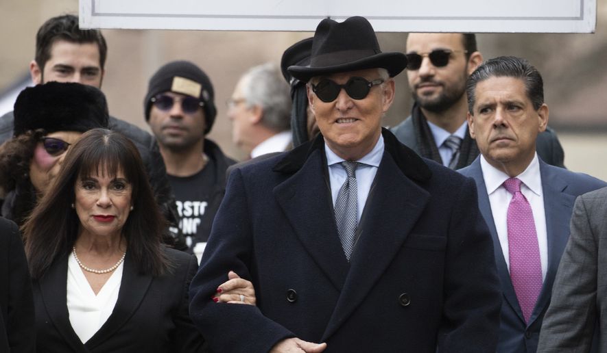 Roger Stone accompanied by his wife Nydia Stone, left, arrives for his sentencing at U.S. District Court in Washington, Thursday, Feb. 20, 2020. Stone, a staunch ally of President Donald Trump, faces sentencing Thursday on his convictions for witness tampering and lying to Congress. (AP Photo/Manuel Balce Ceneta) ** FILE **