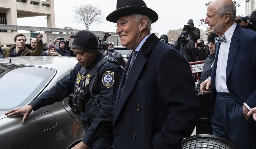 Roger Stone, center, departs federal court in Washington, Thursday, Feb. 20, 2020. President Donald Trump loyalist and ally, Roger Stone was sentenced to over three years in federal prison, following an extraordinary move by Attorney General William Barr to back off his Justice Department&#39;s original sentencing recommendation. The sentence came amid President Donald Trump&#39;s unrelenting defense of his longtime confidant that led to a mini-revolt inside the Justice Department and allegations the president interfered in the case. (AP Photo/Alex Brandon)